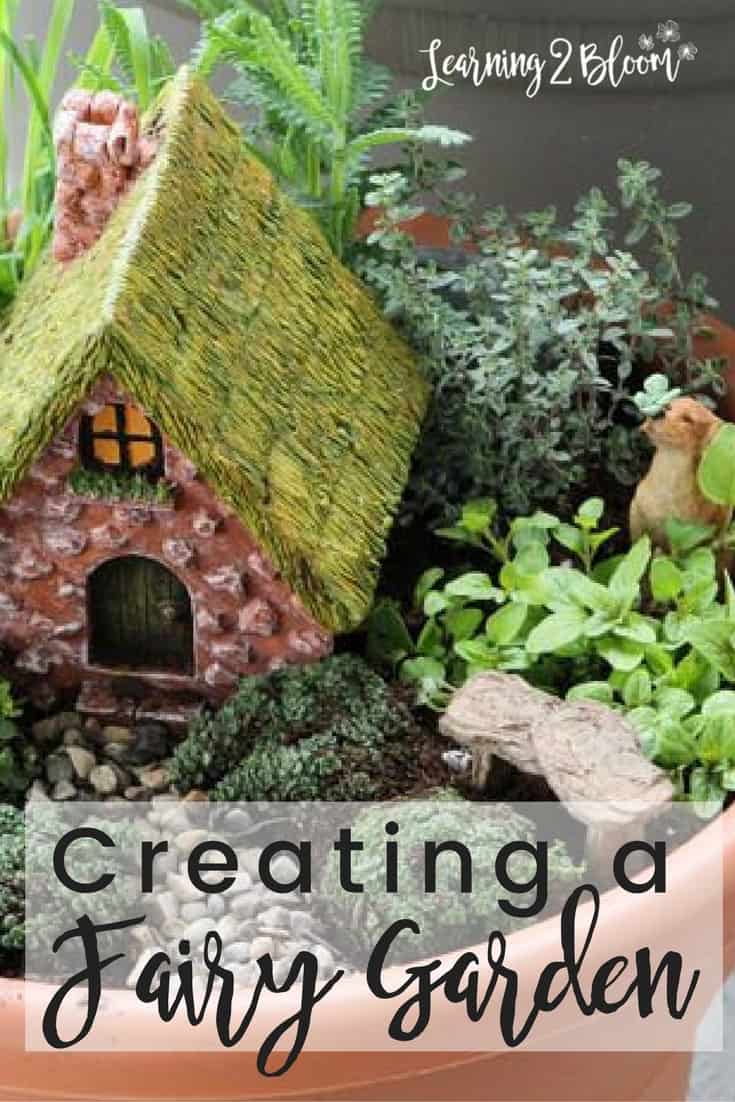 Creating a Fairy Garden with small fairy house, plants and dog