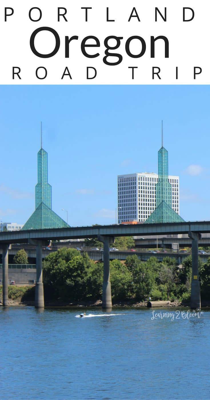 Portland Oregon Road Trip - View of bridge in front of large recognizable buildings in Portland