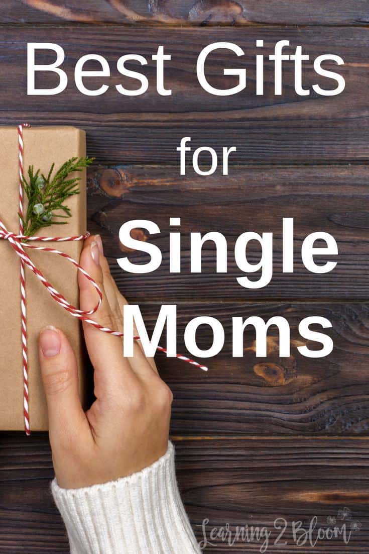 Woman's hand holding wrapped present. Title says "Best gifts for single moms"