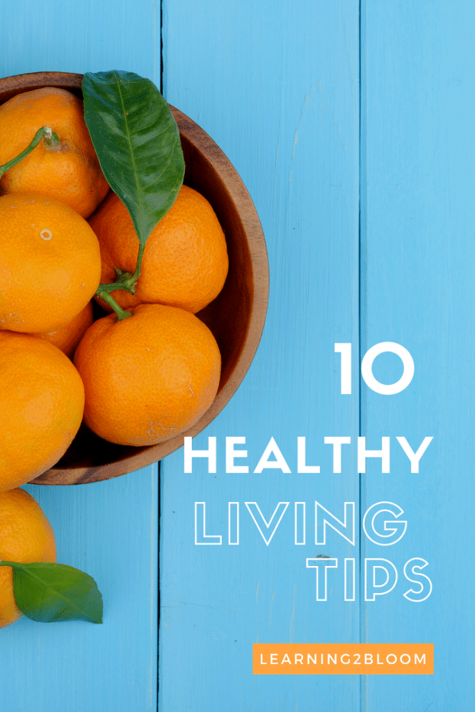 Blue background with oranges in bowl. Title says "10 Healthy Living Tips"