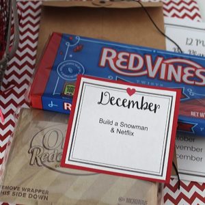 December date idea to build a snowman and Netflix. Envelope with Red Vines and popcorn and Netflix gift card